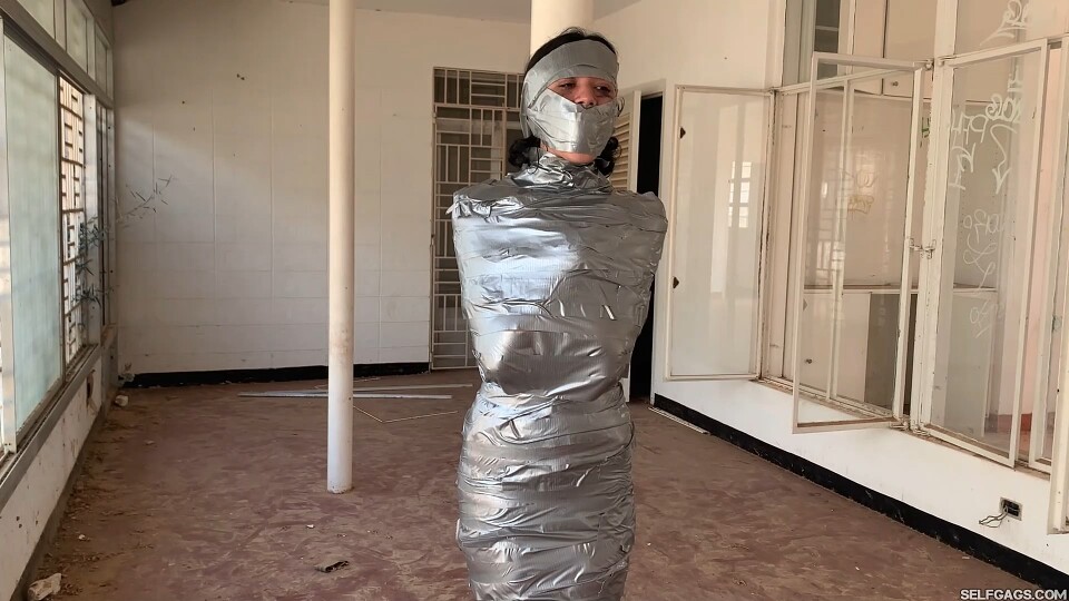 Stranded Girl Mummified To A Pole In An Abandoned House