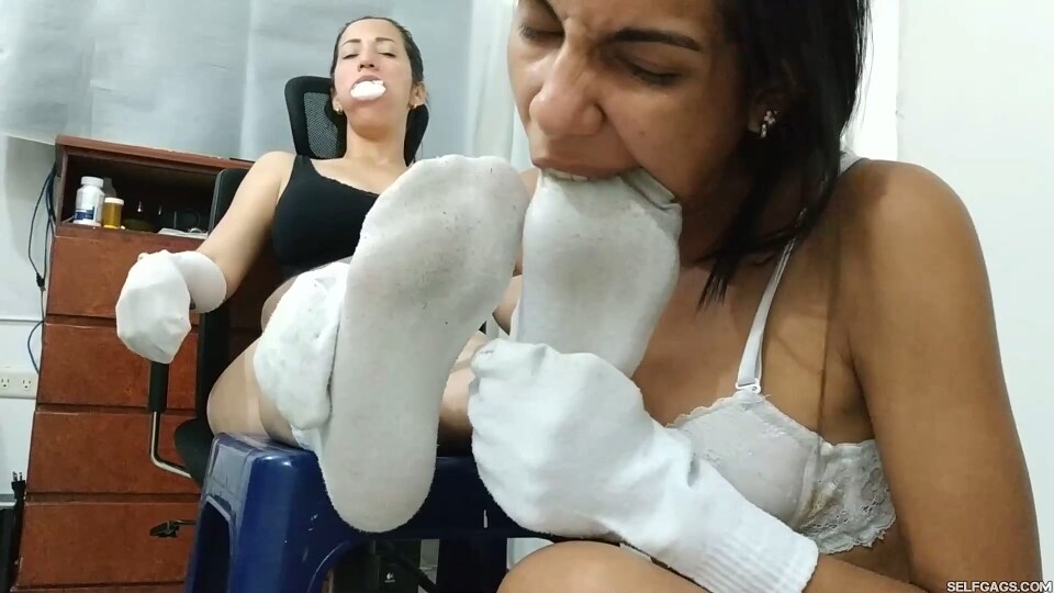 Laura and Maria’s Sock Worship Seduction: Stuffed Mouths and Sucked Feet!