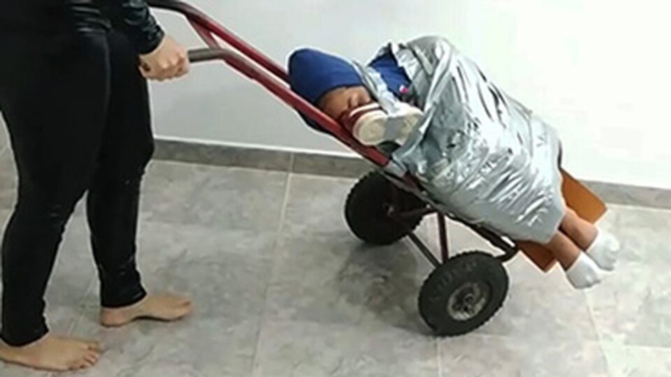 Ball Tied Latina Transported Away On A Box Mover By A Greedy Catsuit Burglar! — poster