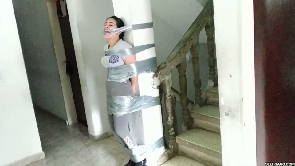 Gagged Stepsister Katherine Taped to Pillar — gallery-3