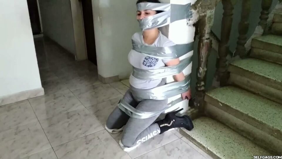 Gagged Stepsister Katherine Taped to Pillar — gallery-4