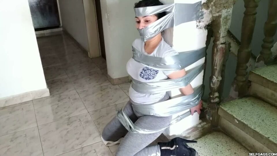 Gagged Stepsister Katherine Taped to Pillar — gallery-5