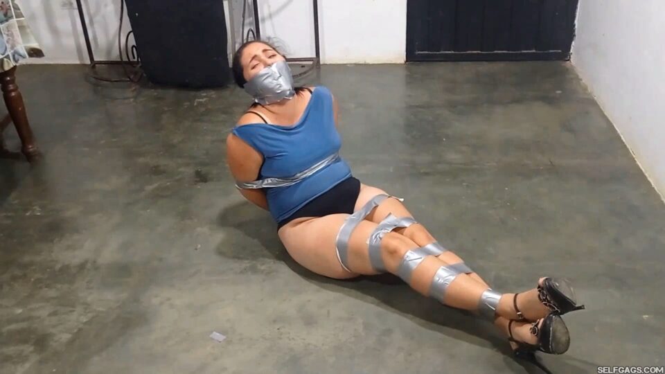 Hysterical Party Damsel Whines And Whimpers In Tight Tape Bondage! — gallery-5
