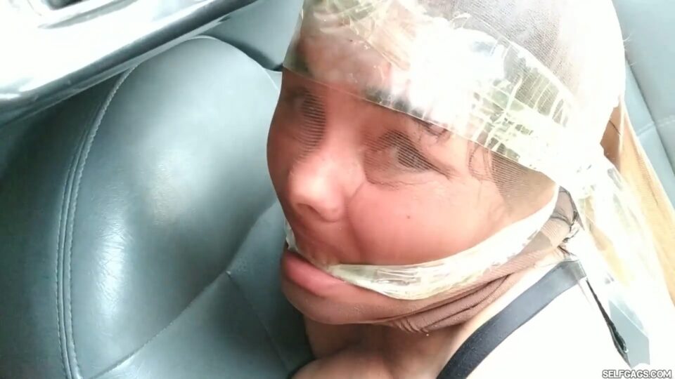 Pantyhose Hooded Latina BBW Hogtied And Transported In The Backseat — poster