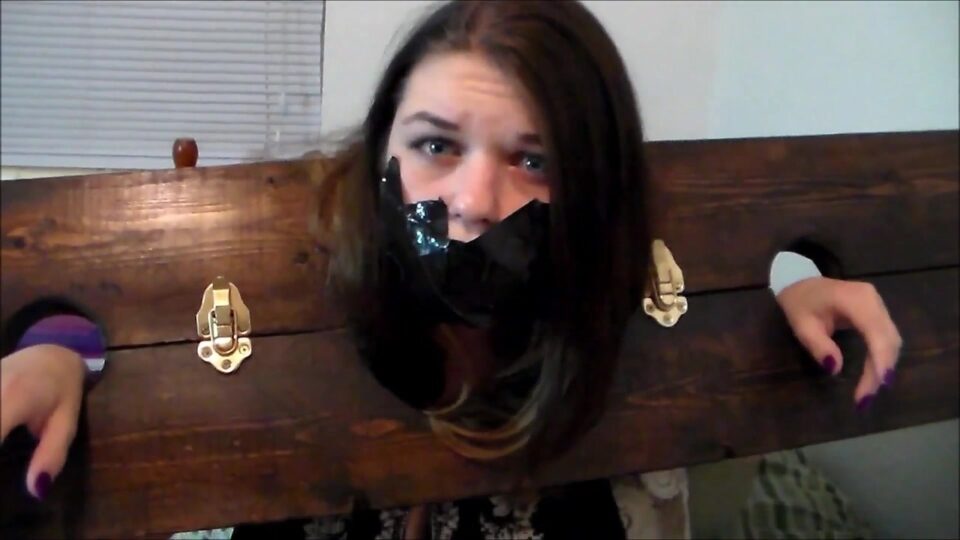 Thieving roommate locked in the stockade and gagged with her own panties! — gallery-8