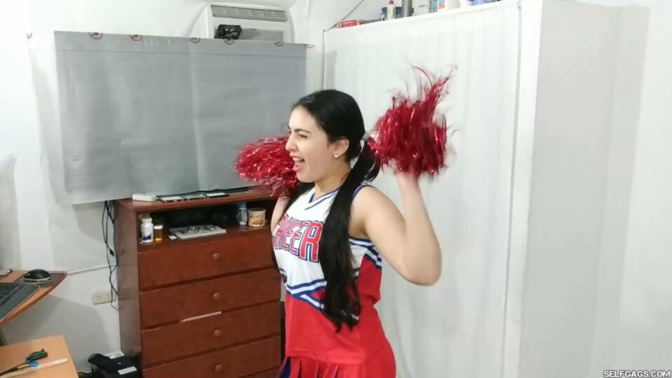 Tied Up Cheerleader Rivals United in a Tape Gagged Kiss — gallery-1