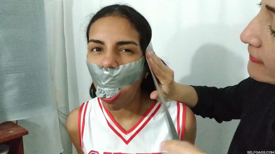 Tied Up Cheerleader Rivals United in a Tape Gagged Kiss — gallery-3