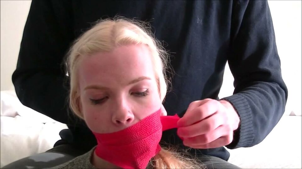 Scandinavian Blonde: All Gagged Up with Inflatable Butterfly, Vet Wrap and a Cruel Double Sock Stuffing Wrapped in Her Mouth with Clear Medical Tape — gallery-7