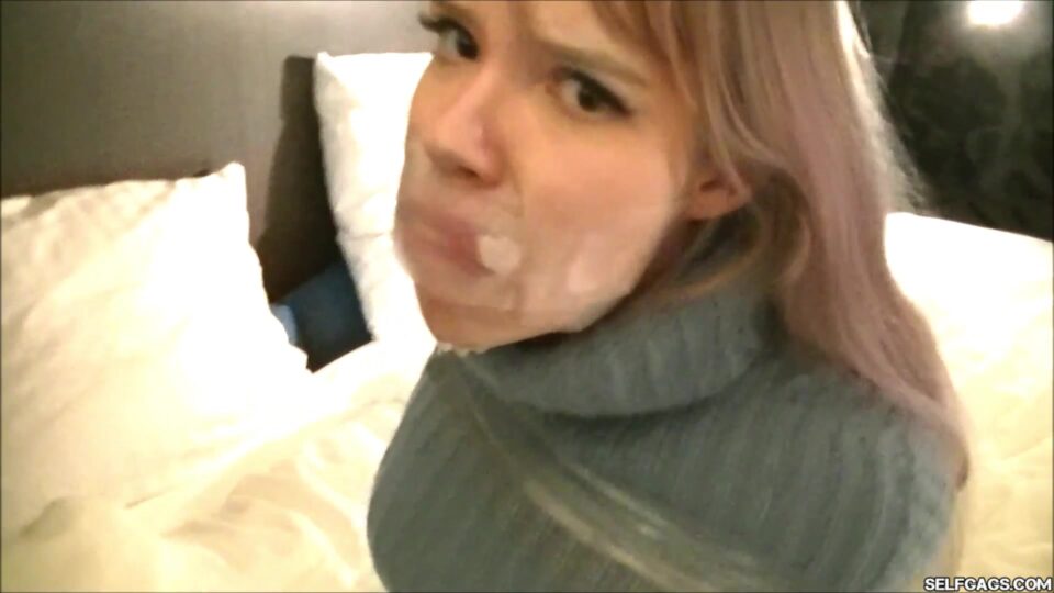 vanessa-scandinavian-bimbo-tape-gagged-grey-sweater-04